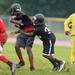 Members of the Ypsilanti Community High School football team practice in the rain at the school on Monday, August 12, 2013. Melanie Maxwell | AnnArbor.com